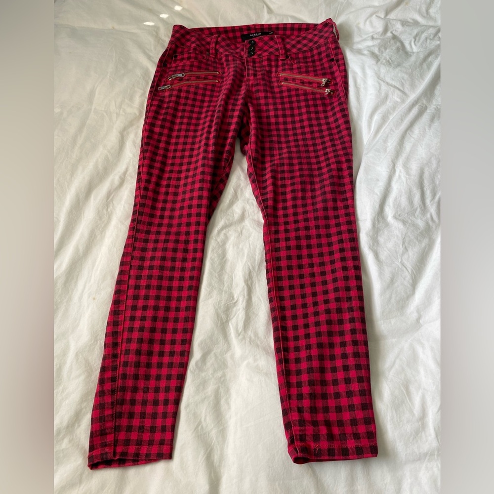 Torrid size 12 regular black and red check skinny jeans.